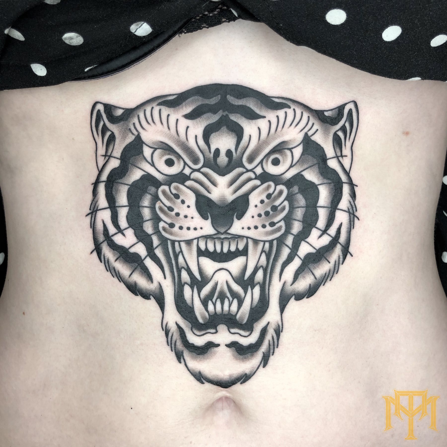 Bold tiger tattoo from Trade Mark Tattoo
